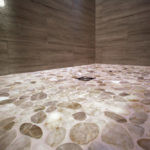 Kootenay Flat Pebbles installed in a shower