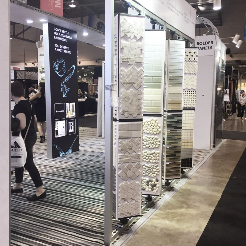 Tile and Stone Source mosaic racks in the new tradeshow booth